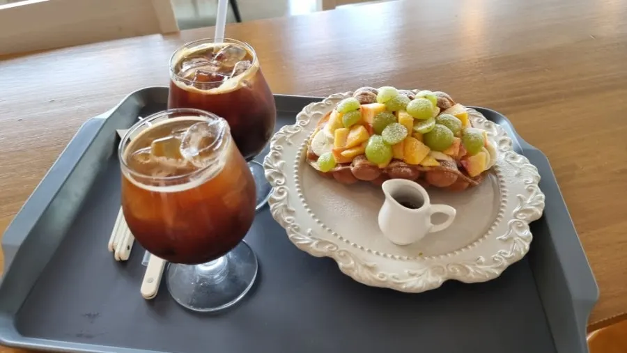 Nyanya's Hong Kong waffle piled with seasonal fruit
