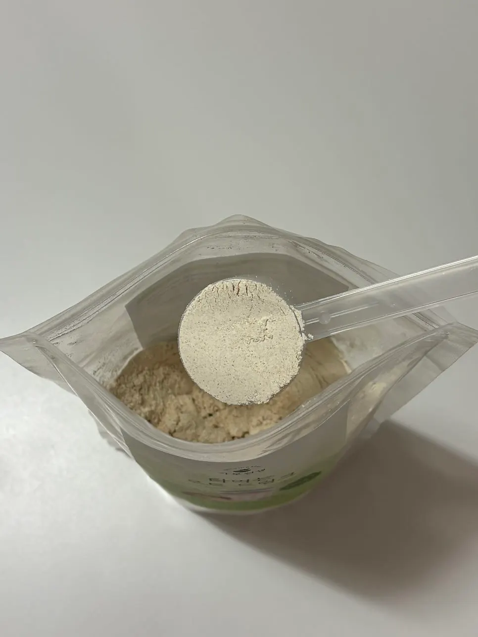 A glass of thickly mixed oat drink