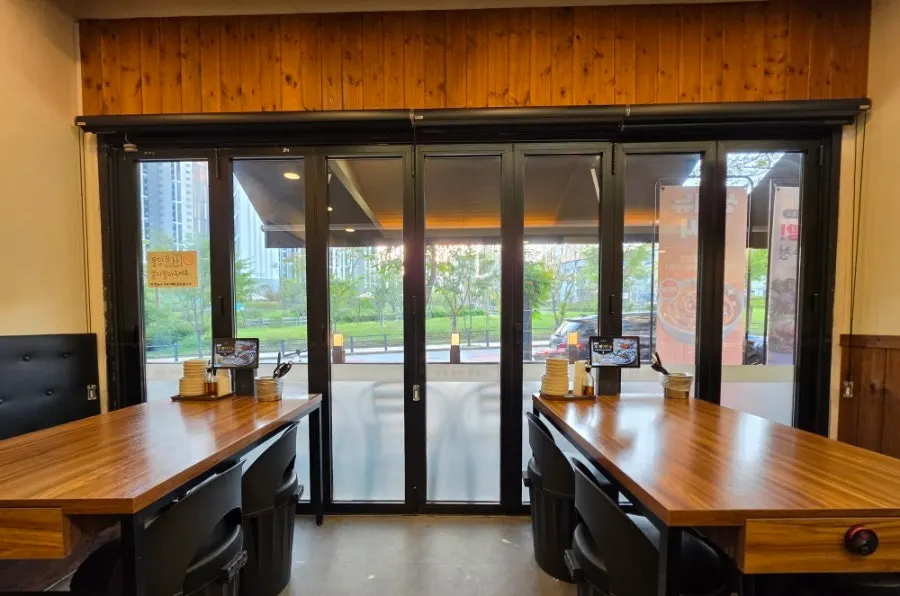 Interior of Obongjip Beombak-jeom with wooden tables