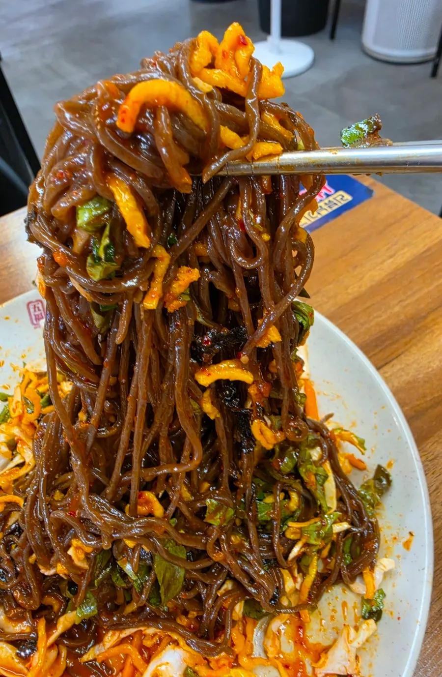 Chuncheon-style makguksu mixed with sauce
