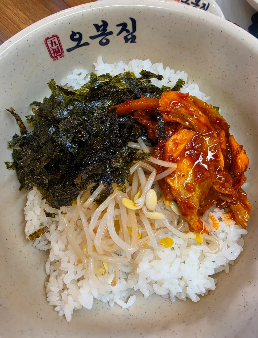 Stir-fried octopus with rice, bean sprouts, and crumbled seaweed