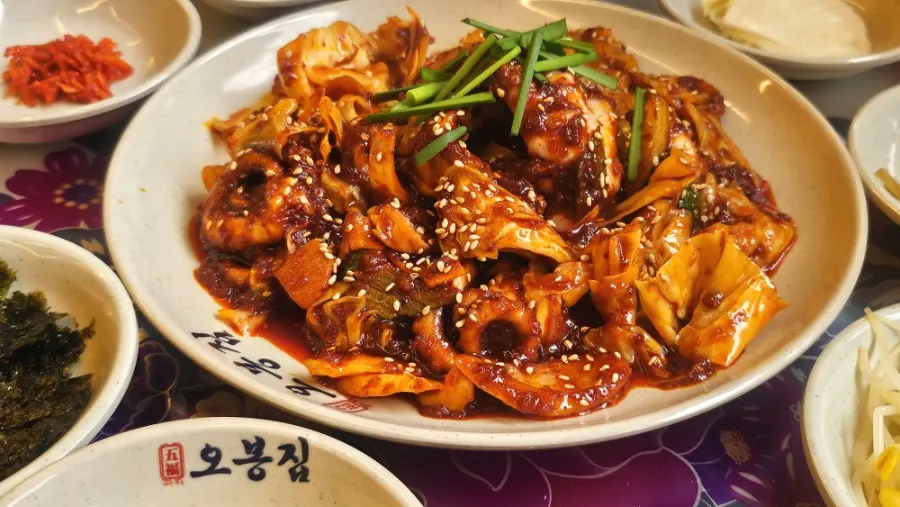 Close-up of the fire-grilled octopus stir-fry showing springy octopus
