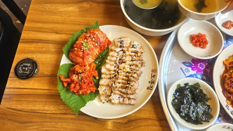 Octopus bibimbap mixed with sesame oil and seaweed flakes