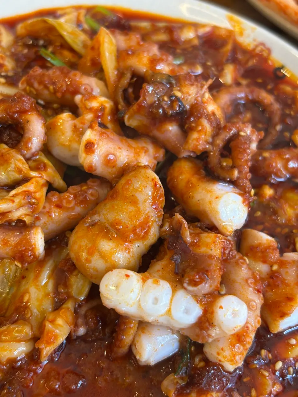 Fire-grilled octopus stir-fry made with whole octopus