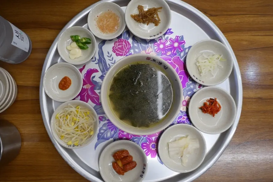 Basic side dishes served on a rustic tray