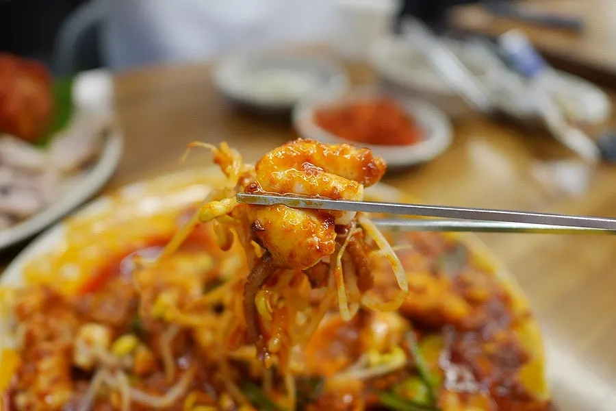 Octopus stir-fry topped with unlimited-refill bean sprouts