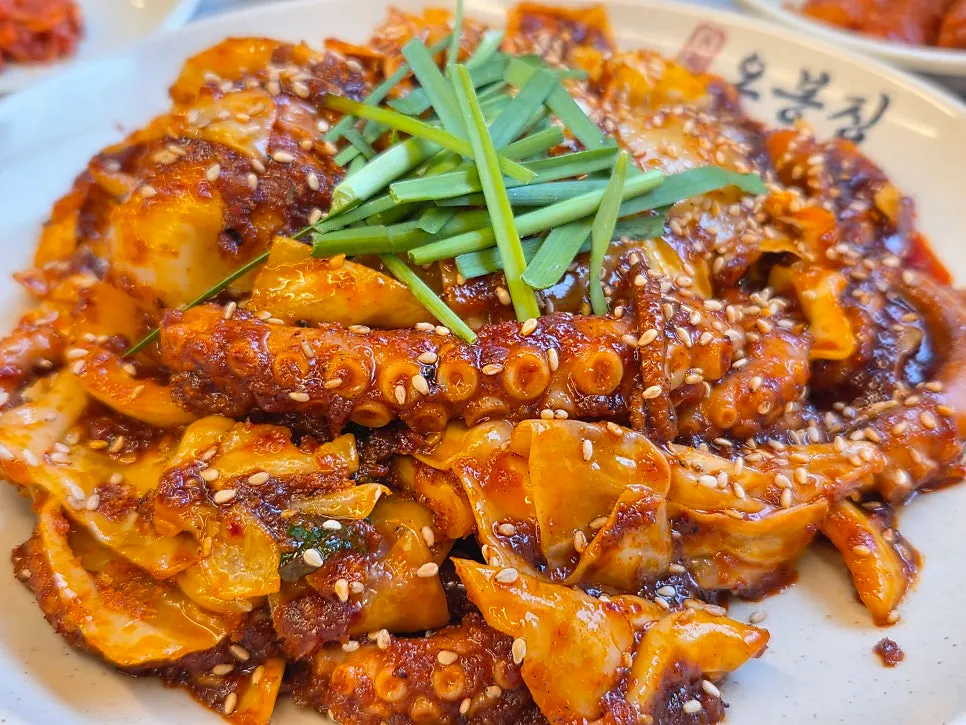 A full pan of smoky pan-fired octopus stir-fry