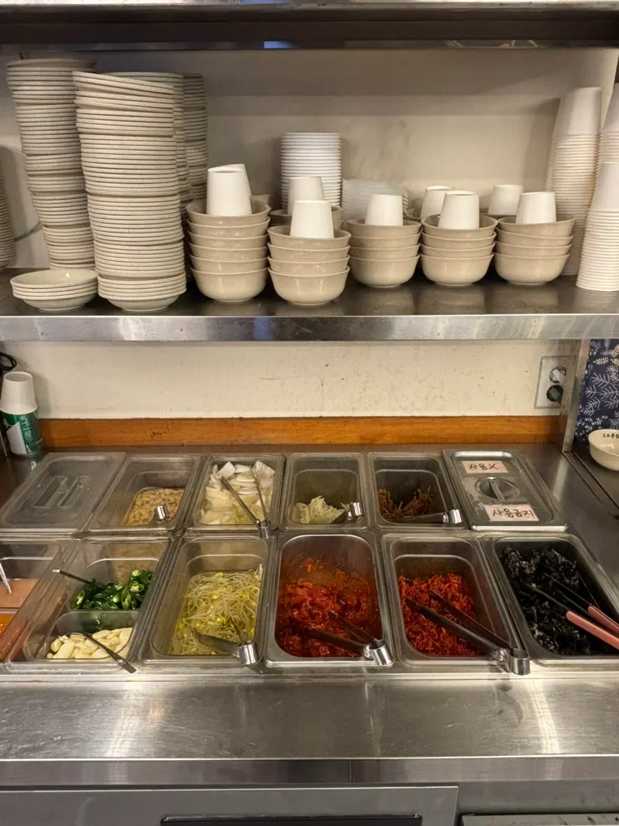Self-serve bar with side dishes and seaweed soup