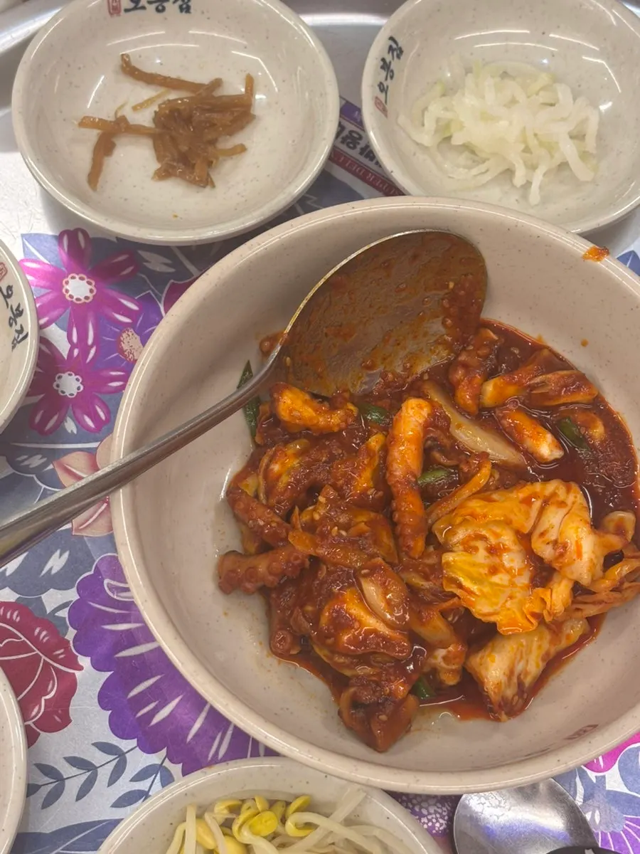 Spicy octopus stir-fry mixed with cabbage and vegetables