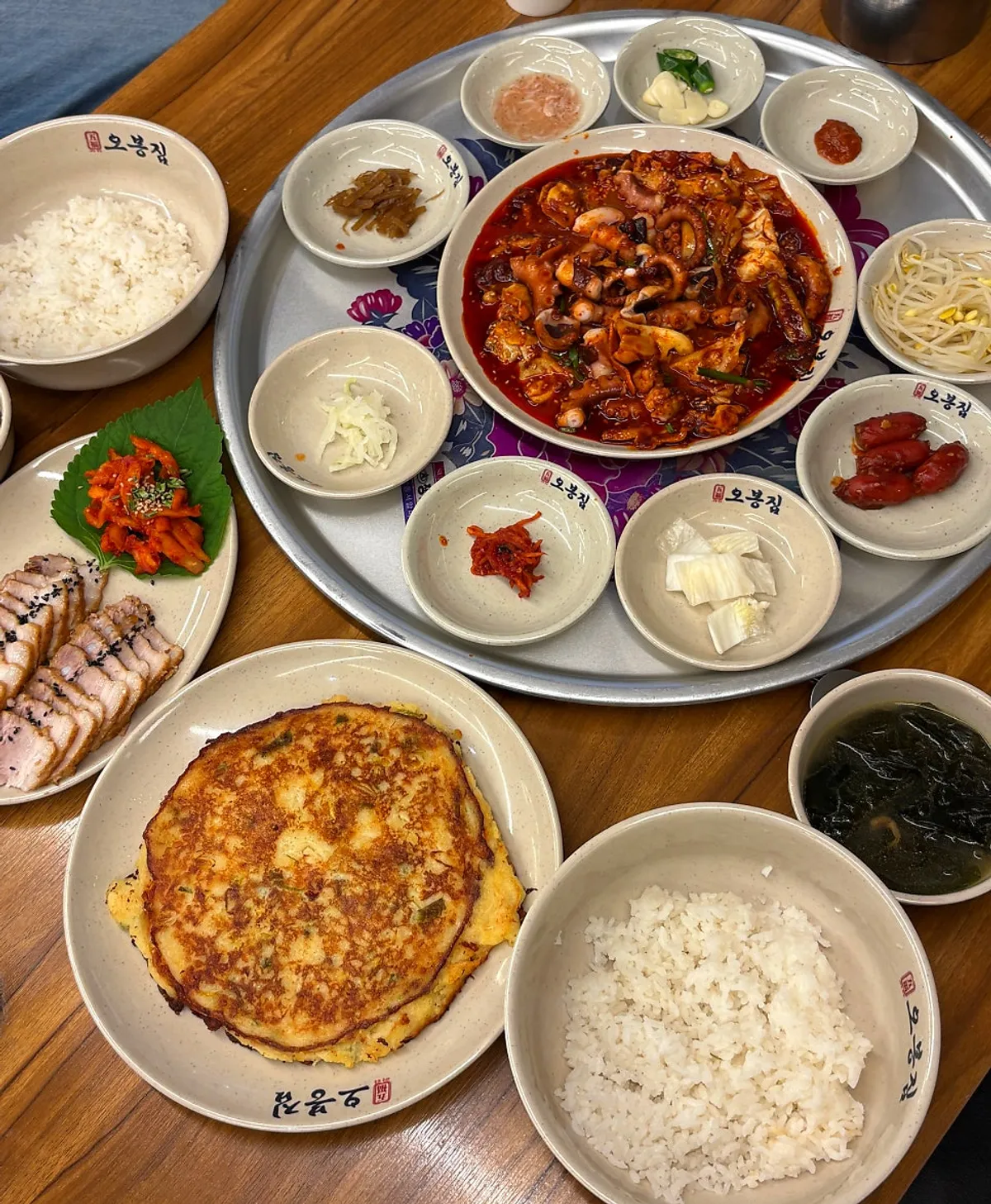 Grilled octopus stir-fry and bossam set together