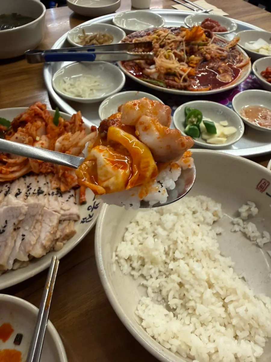 Octopus stir-fry bibimbap mixed with seaweed and sesame oil