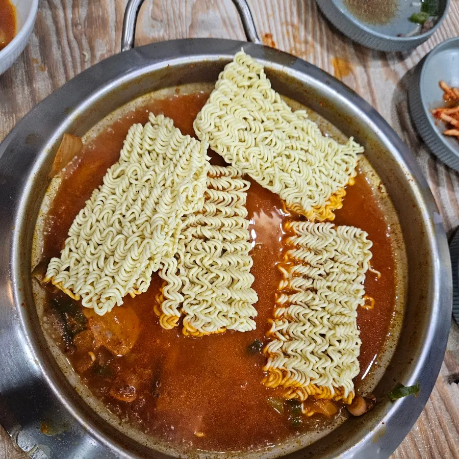Ramen noodle block added to the budae jjigae