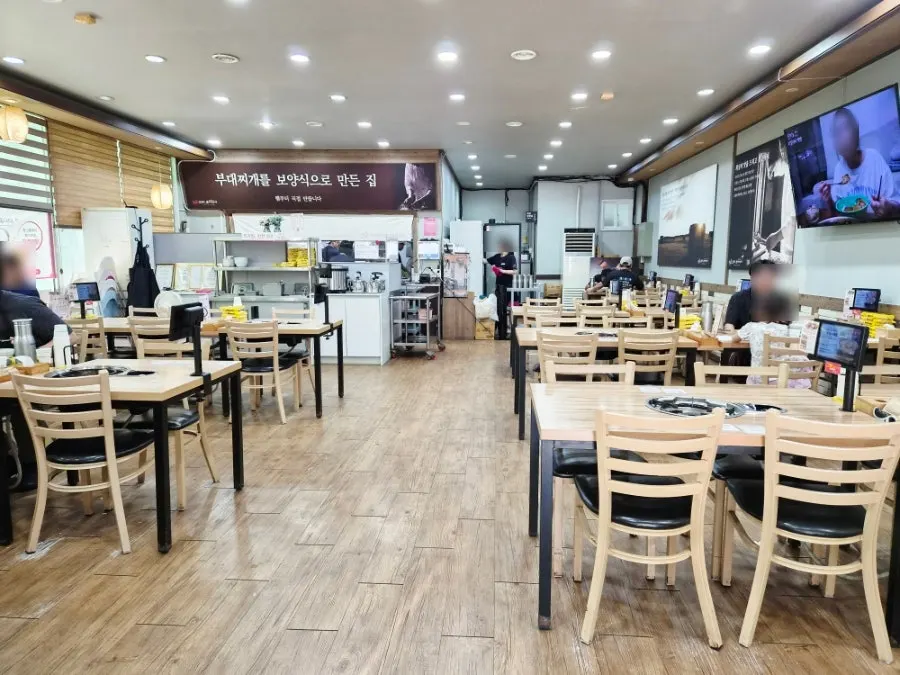 Indoor seating at the Ochang budae jjigae restaurant