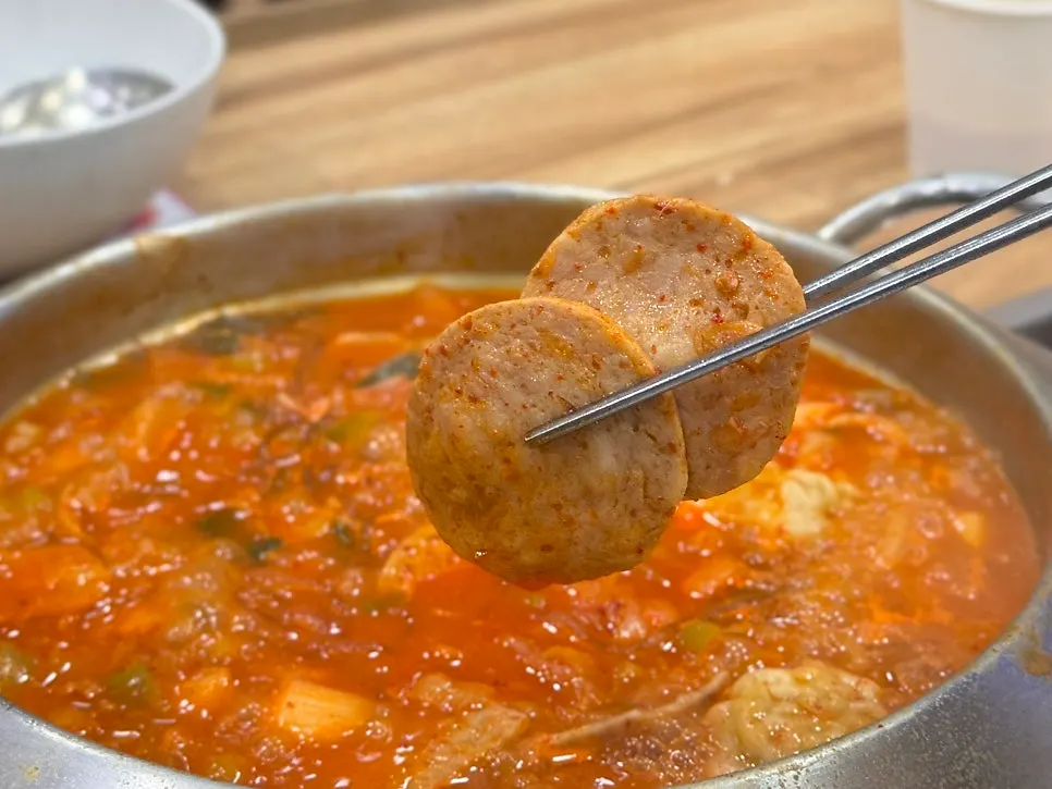 Gorae Traditional Flower Budae Jjigae in sanghwang mushroom broth