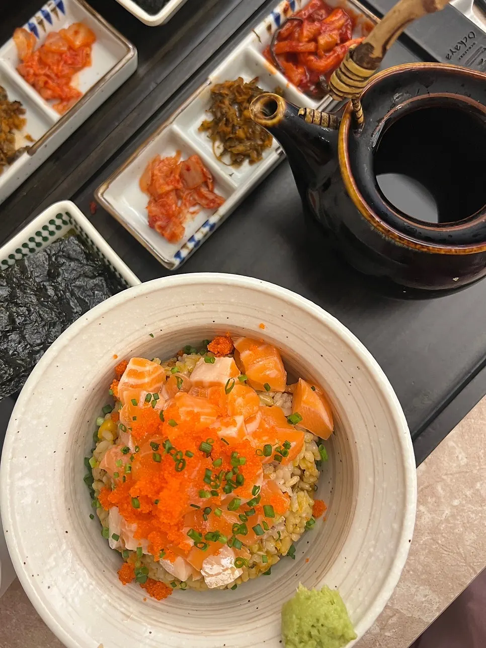Sakechazuke topped with diced salmon and flying fish roe