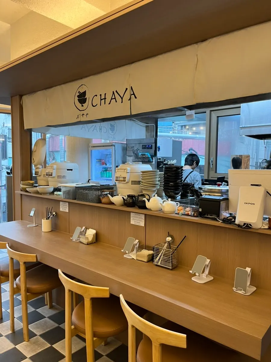 Ochaya's solo-dining bar table with a phone stand