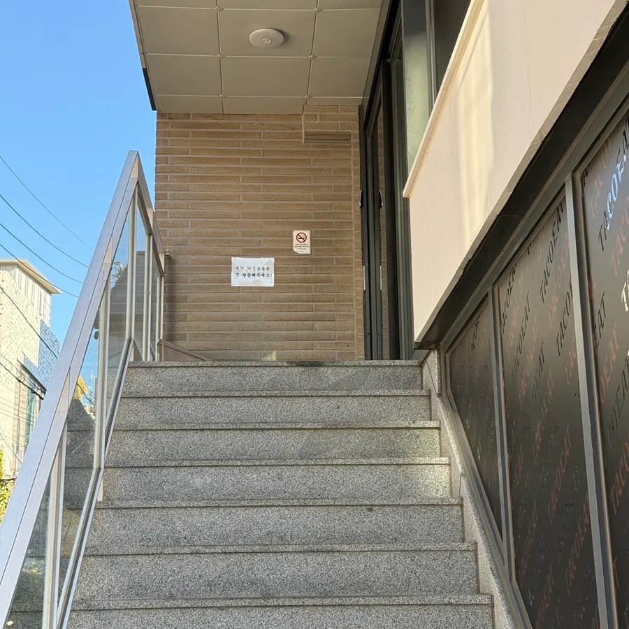 Stairway entrance leading up to Ochaya on the 2nd floor
