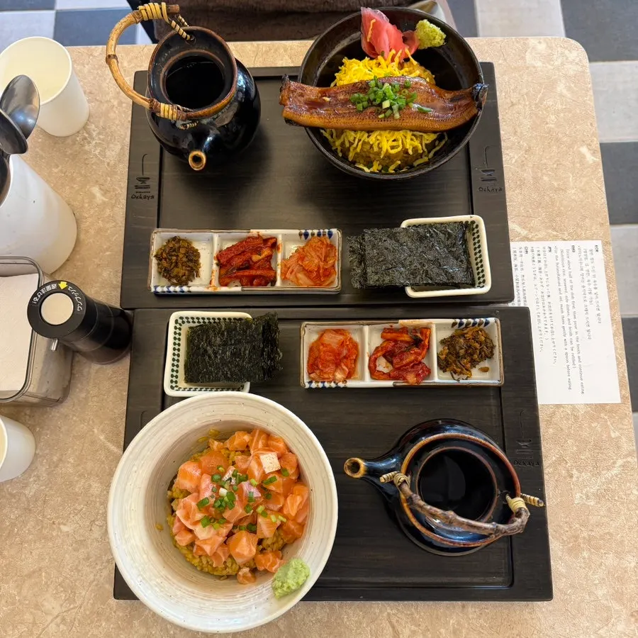 Table set with sake ochazuke, unagi ochazuke, and shrimp tempura