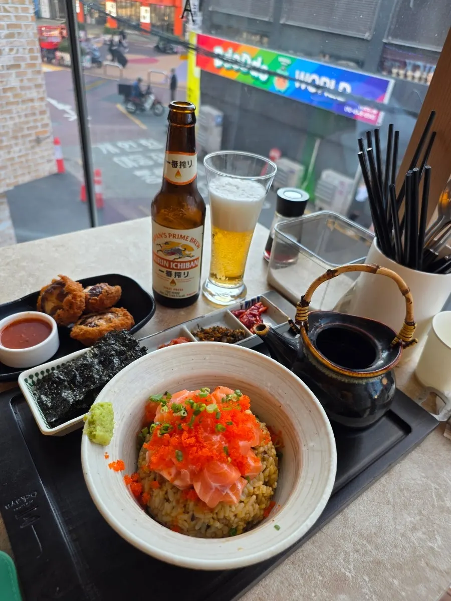 Close-up of sake chazuke piled with toppings