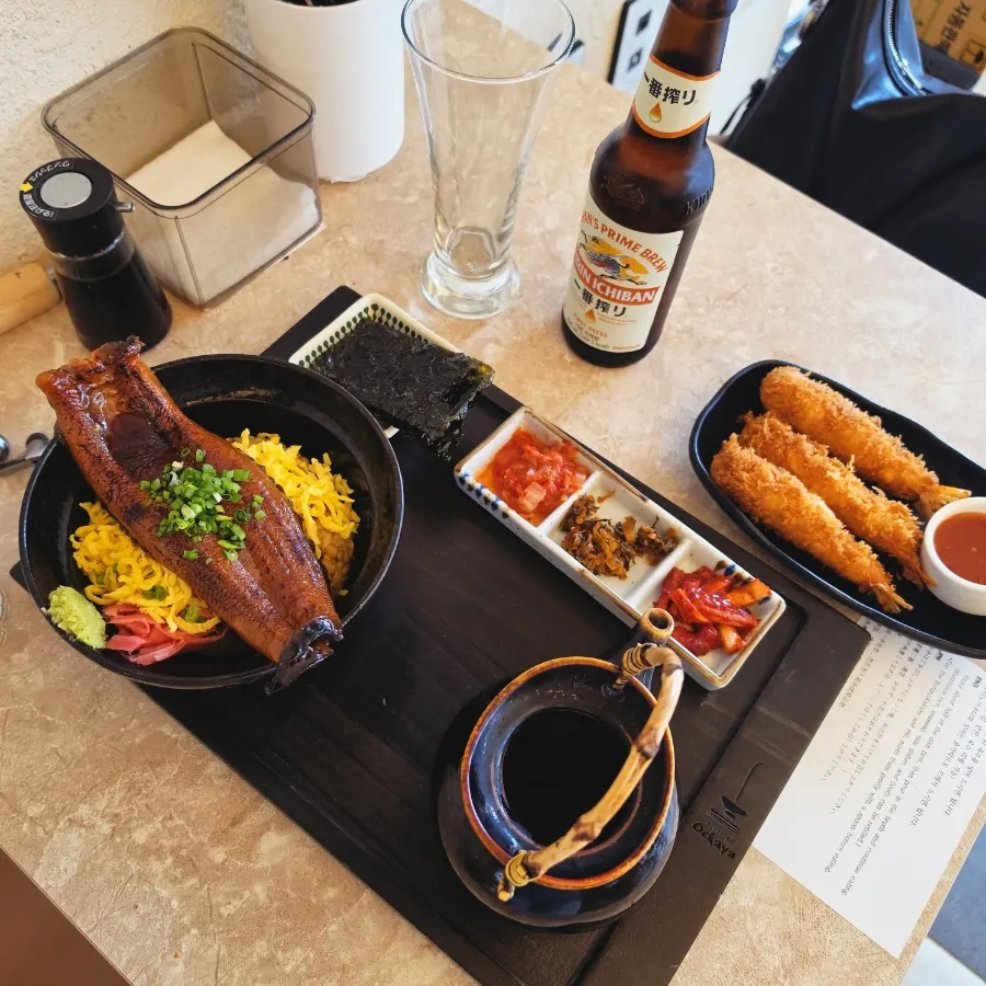 Unagi ochazuke, shrimp tempura, and Kirin Ichiban served together