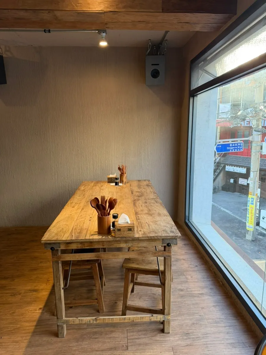 Wood-toned interior of Ochaya Yeonnam