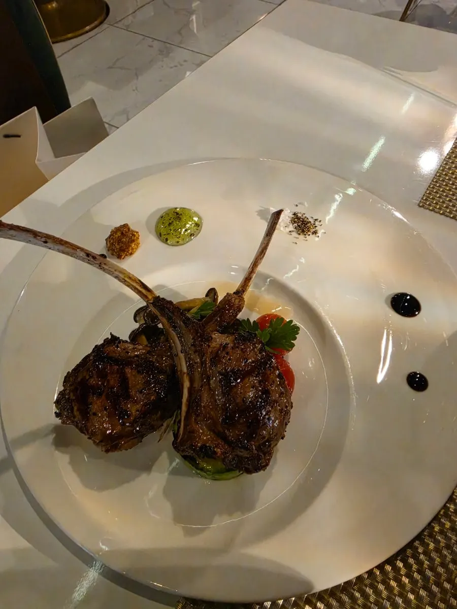 French rack lamb steak served with mint jelly and mustard