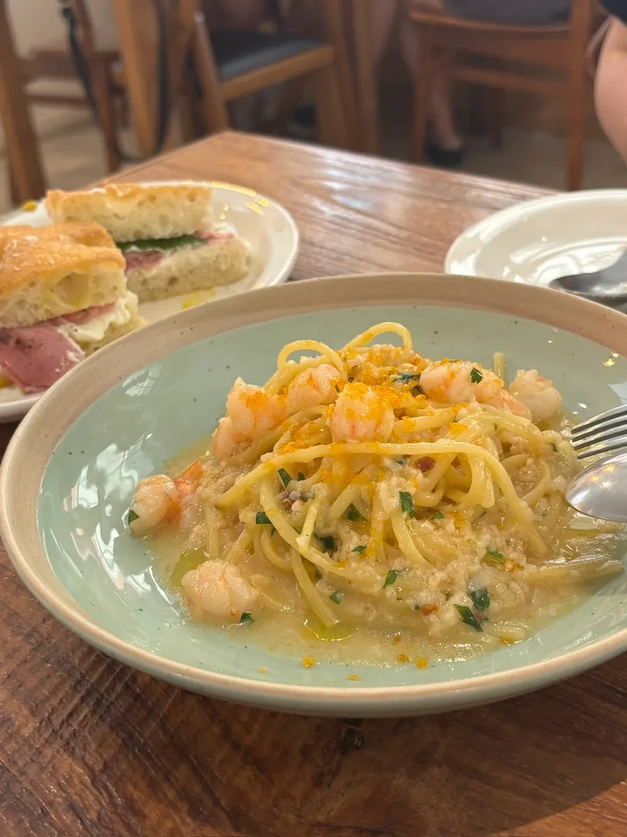 Close-up of a bite of the focaccia sandwich