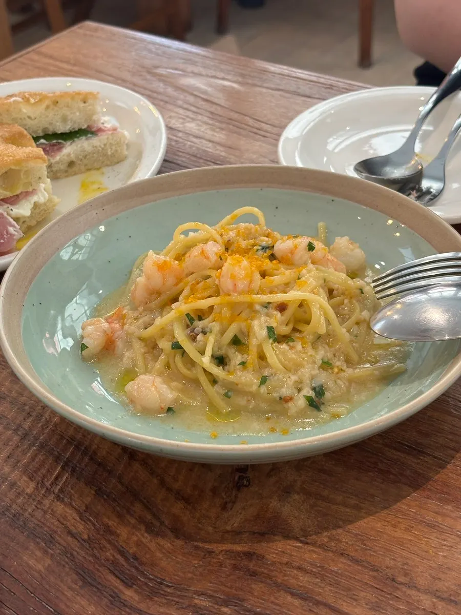 A plate of bottarga aglio olio pasta