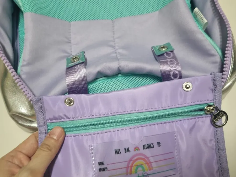 Zip pocket with a name tag