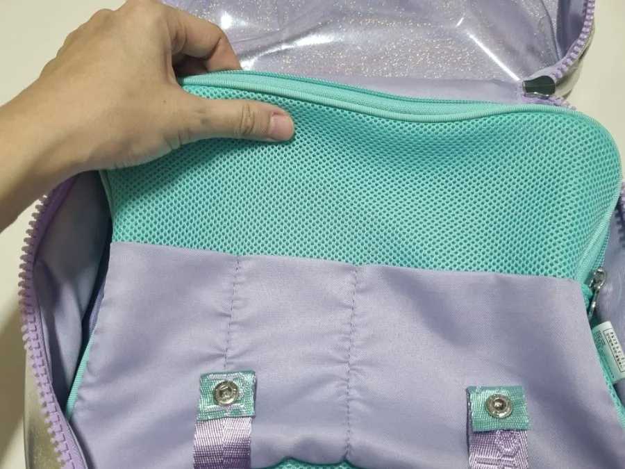 Zip pocket used as an everyday pouch
