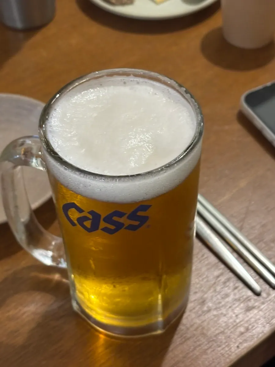 Cass draft beer served in a 500cc glass