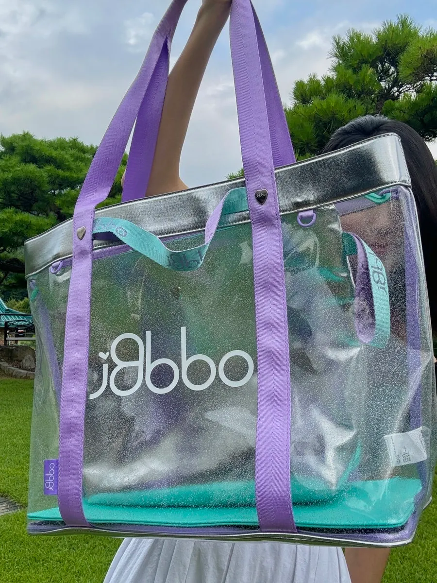 Holographic transparent beach bag in sunlight