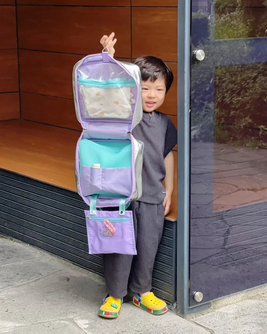 Hanging wash bag with belongings stored inside