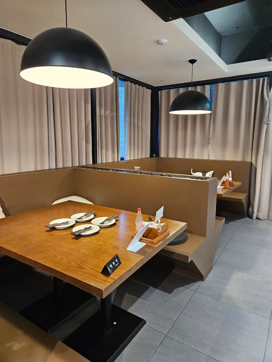 Private seating with an L-shaped sofa