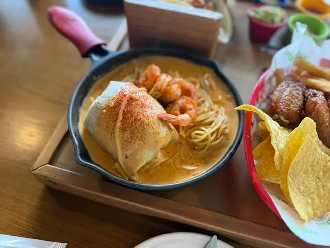 Chipotle cream pasta and burrito in the platter