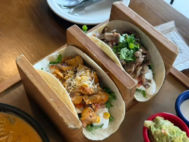 Table set with several Mexican dishes