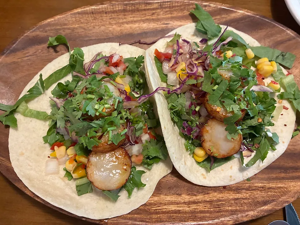 Scallop tacos with corn and onions