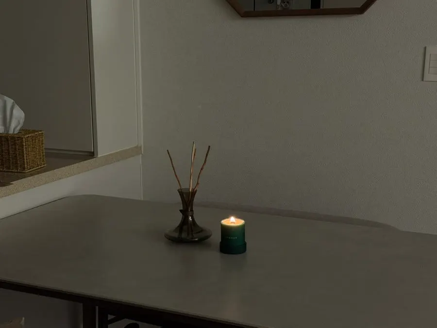 Offgray candle placed like an interior accessory