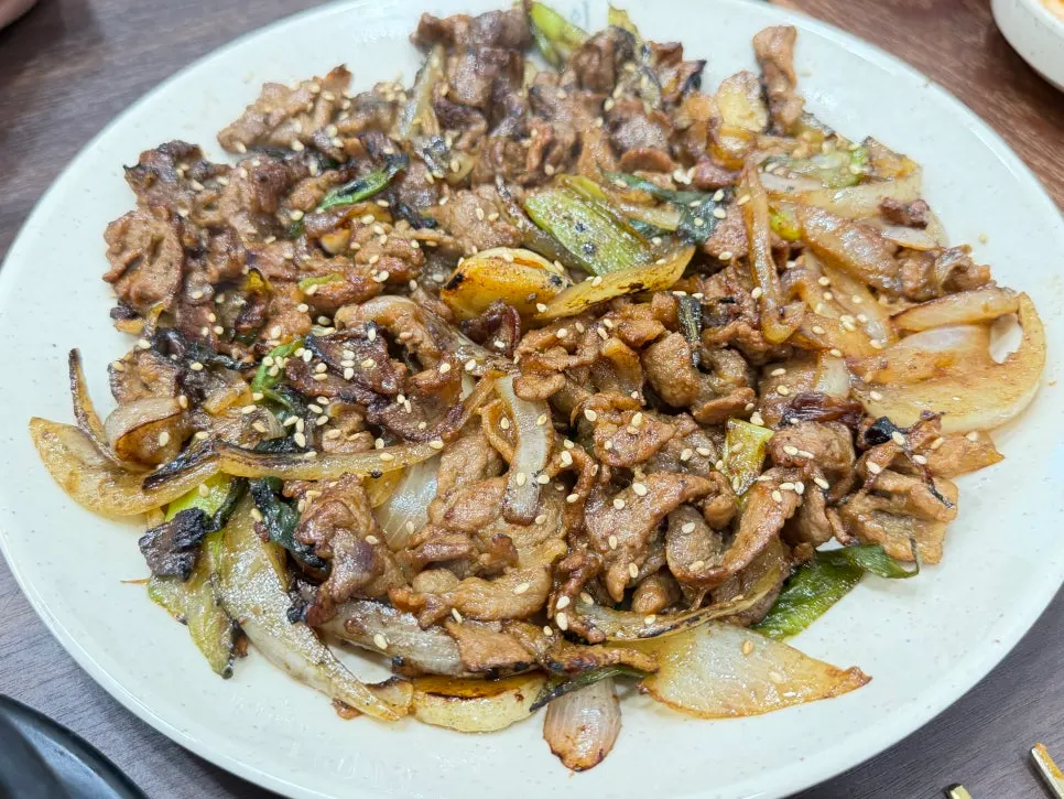 A piece of soy-marinated pork with straw-fire aroma