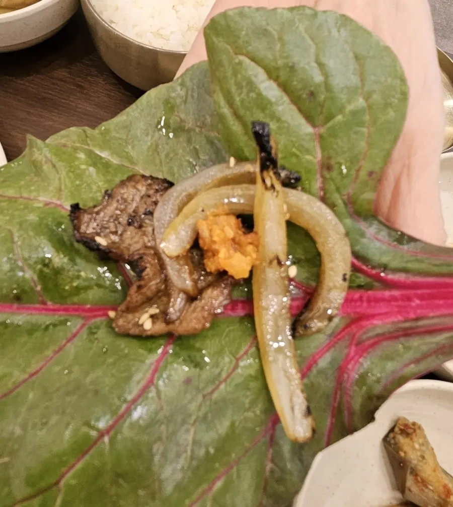 Straw-fire-grilled pork served with ssam vegetables