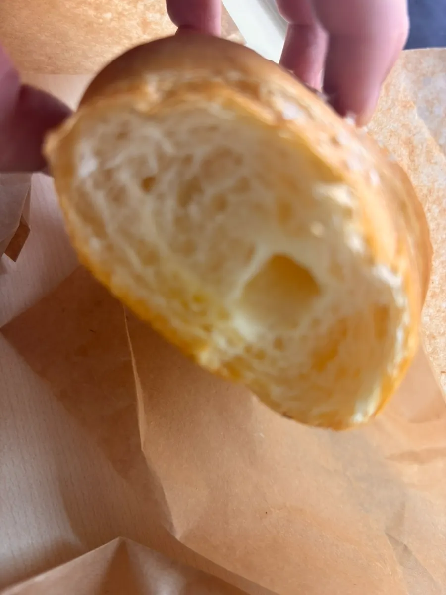 Crack salt bread with a bite taken out