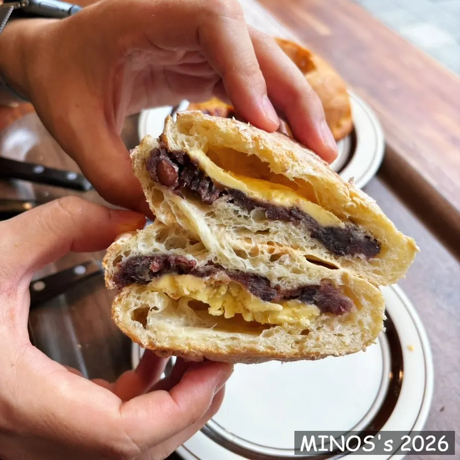 A spread of coffee, bread, and desserts