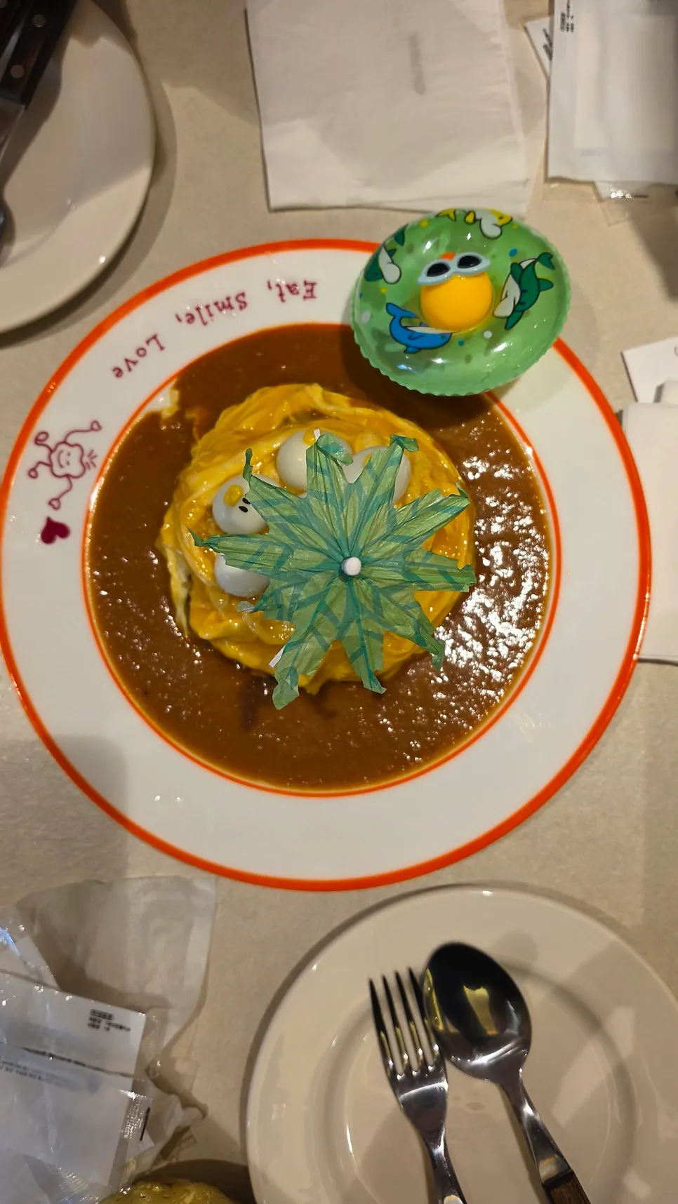 Rubber duck omurice topped with small duck face decorations