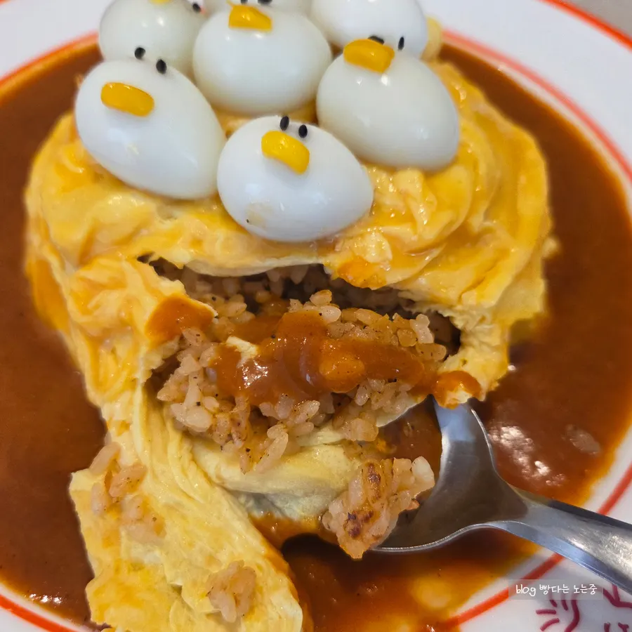 Soft egg inside the omurice cut open