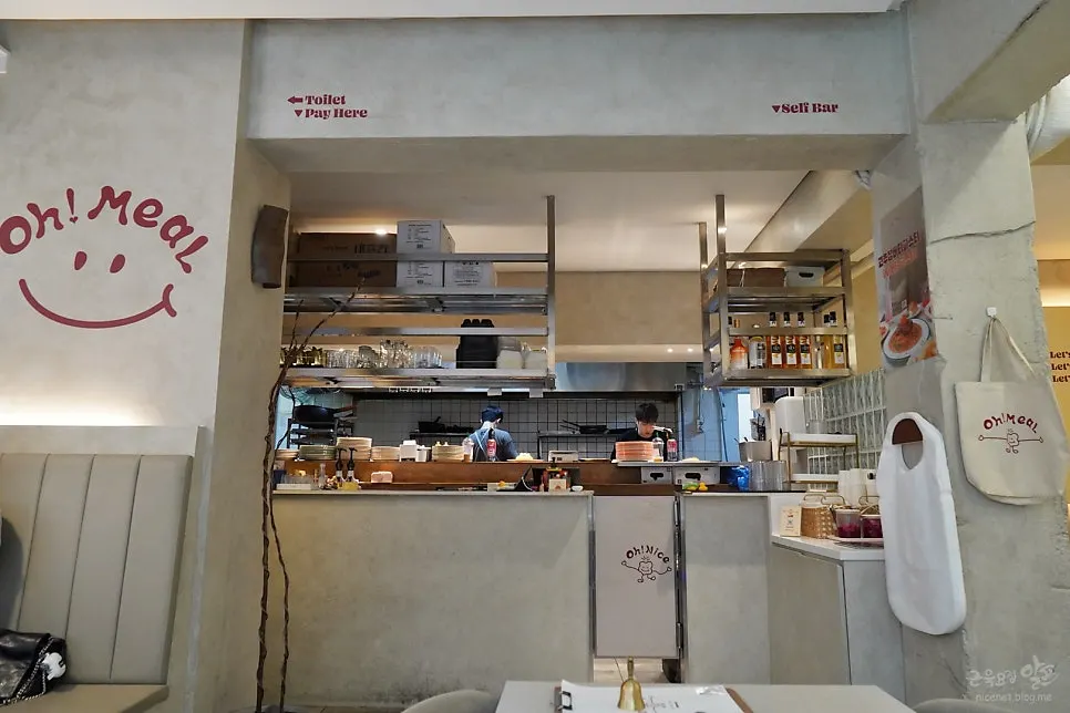 Open kitchen with visible cooking process
