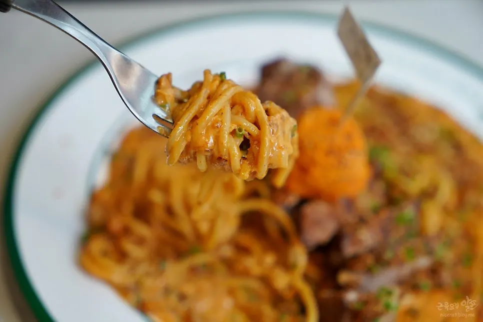 A forkful of gochujang butter pasta