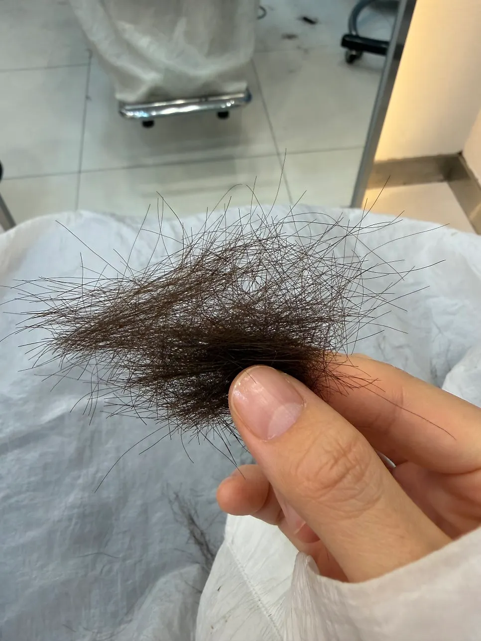 Long, wet hair before the cut