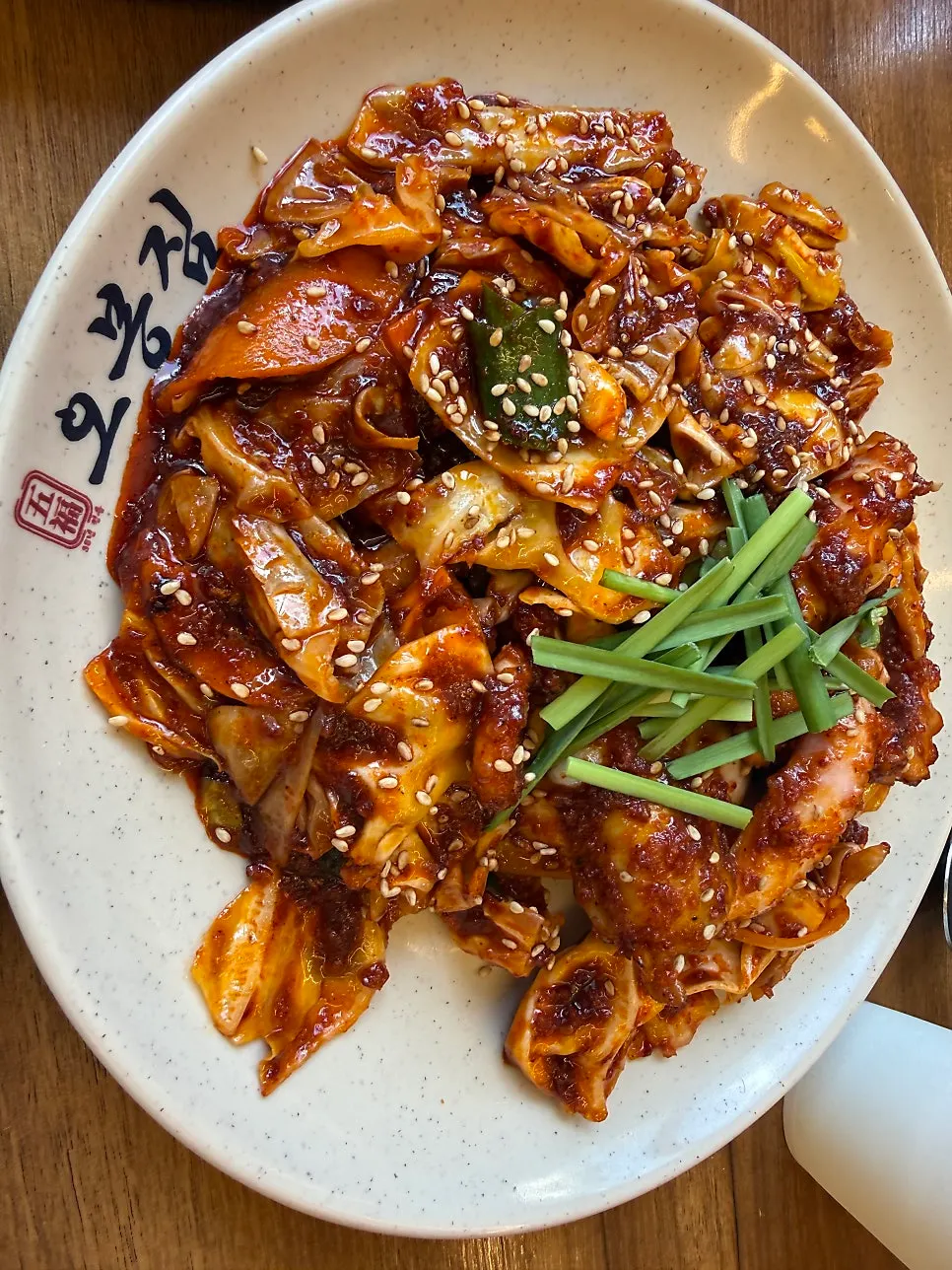 Close-up detail of the fire-grilled octopus stir-fry plate