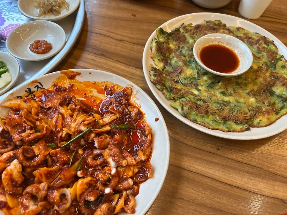 Table spread with octopus stir-fry and buchujeon