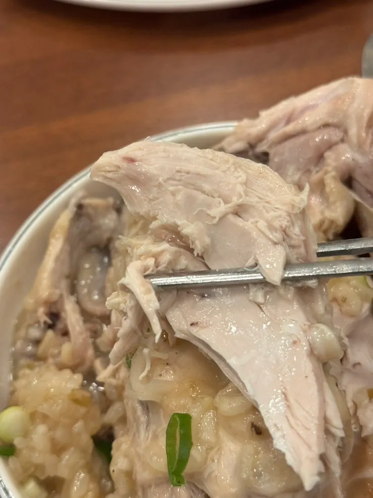 Tender chicken thigh meat pulled off the bone